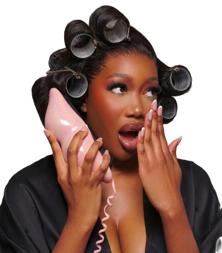 Black woman wearing a long Brazilian wig — Thandy Beauty Therapist